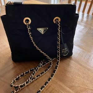 Brand new Prada 1995 re-edition. New release in 2023. Worn once or twice